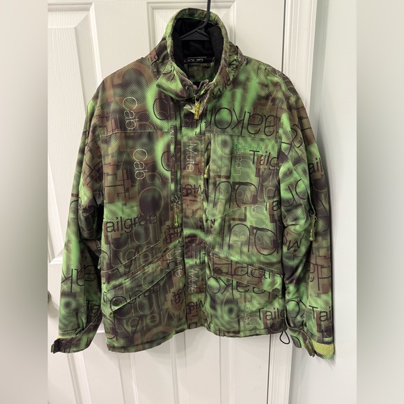 Liquid ski snowboard jacket in a green and brown abstract pattern large